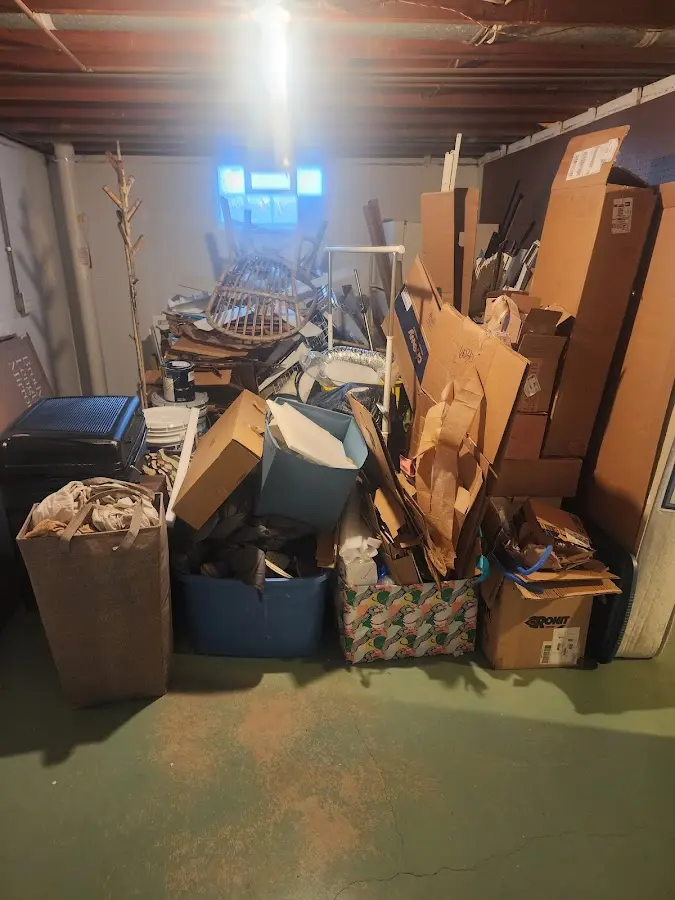 Roll-off dumpster container at job site for Yard Waste Dumpster Rental in Pawling